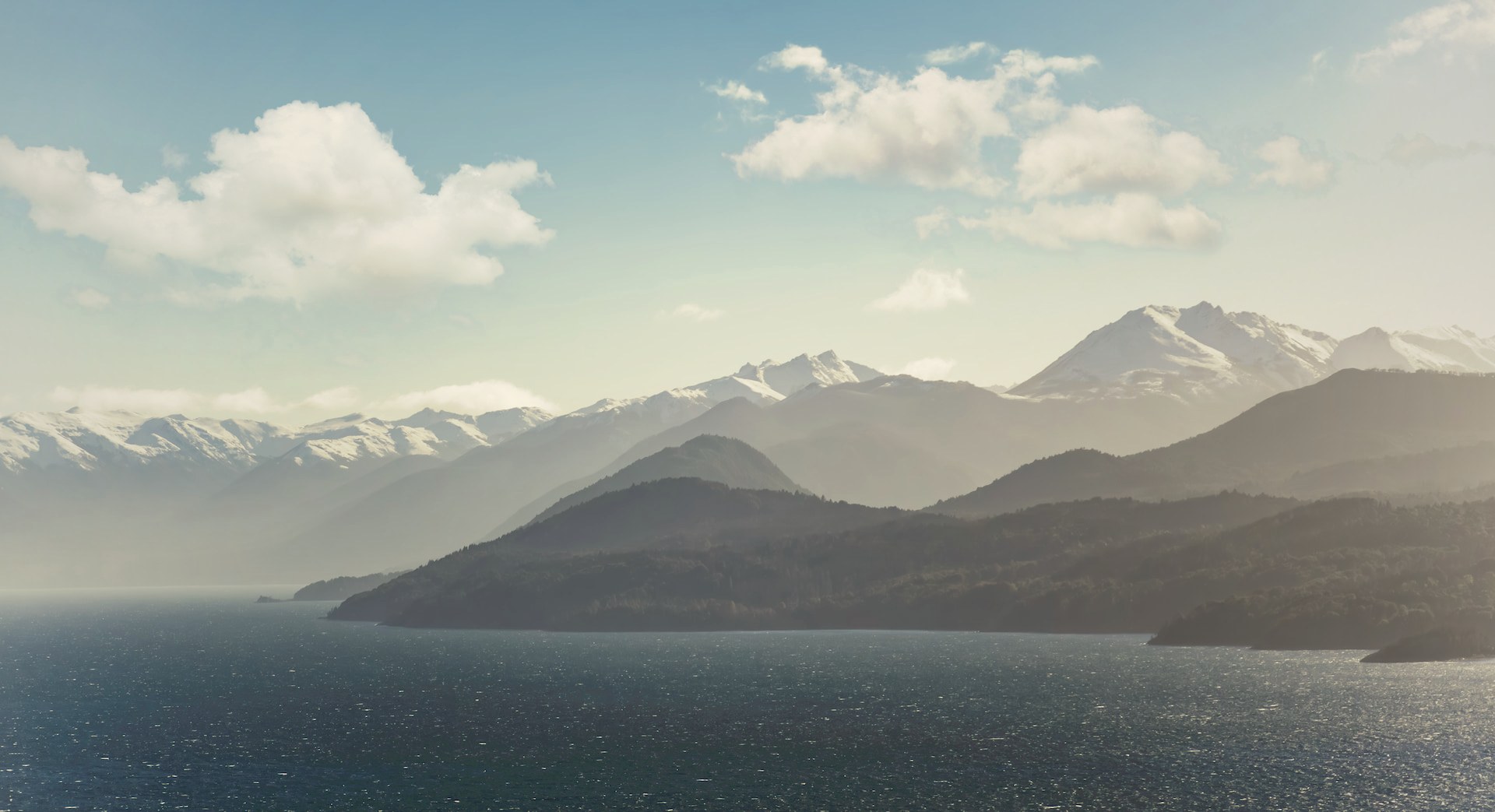 Panoramic view of Nahuel Huapi Lake and snow-capped Andes mountains seen from Villa Beluno luxury hotel in Bariloche, Patagonia, Argentina